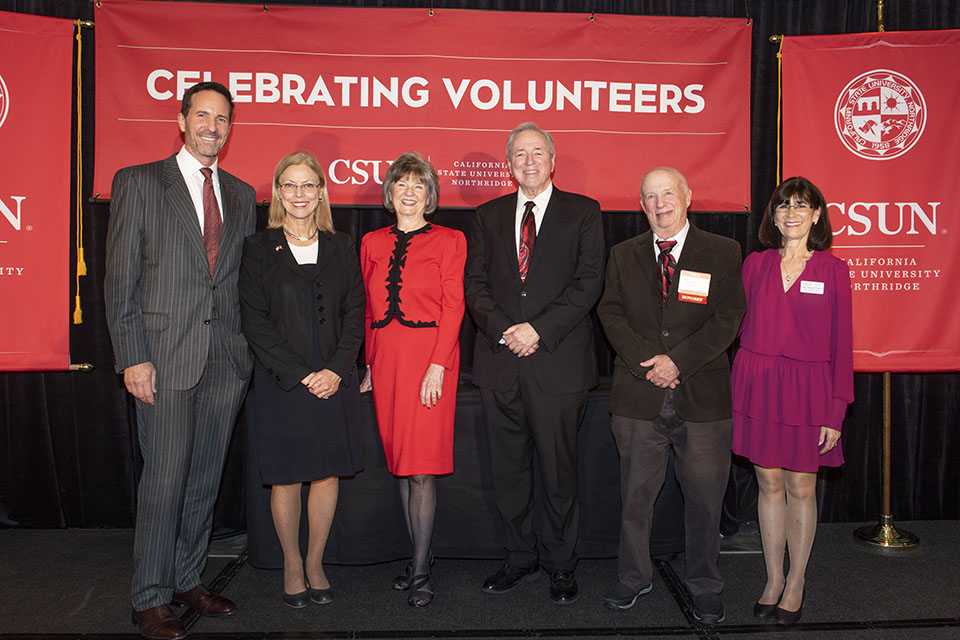 Steven Oppenheimer (second from right) with fellow awardees Earl Enzer, Bonnie Faherty, and Edward Feldman, and CSUN President Dianne F. Harrison and Alumni Association President Cindy Chernow at the Volunteer Service Awards. (Photo via CSUN Today.)